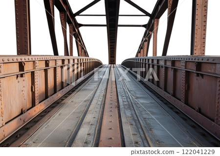 a rough metal bridge entrance going into the distance on the white background  122041229