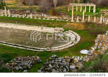 Ruins of pool surrounded by columns amidst park in Aphrodisias, Turkey Ruins of pool surrounded by columns amidst park in Aphrodisias, Turkey 122042678