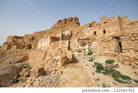 Ksar Guermessa located under the peak of Ras Oum Moutmana, Tunisia 122042761