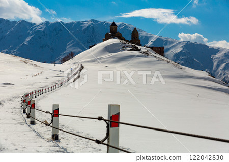 Gergeti Trinity Church against the mountain Kazbek 122042830