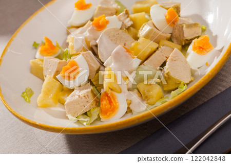 Image of tasty chicken salad with egg and pineapple 122042848