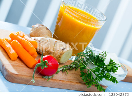 Carrot juice with ginger Carrot juice with ginger 122042873