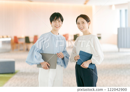 Portrait of a woman working in the office Portrait of a woman working in the office 122042900
