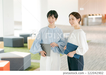 Portrait of a woman working in the office Portrait of a woman working in the office 122042902