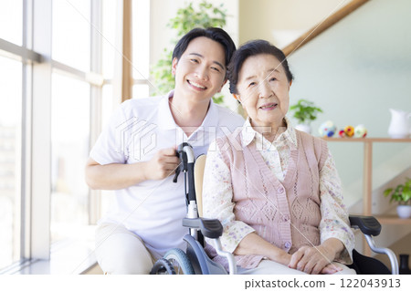 Image of care: Caregivers caring for the elderly 122043913