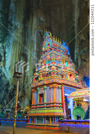 Batu Caves, a Hindu holy site protected by Lord Murugan Batu Caves, a Hindu holy site protected by Lord Murugan 122044311