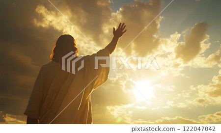 Jesus Christ raising his hands towards the sky 122047042