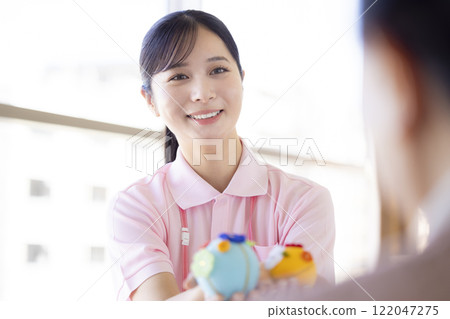Caregiver portrait 122047275