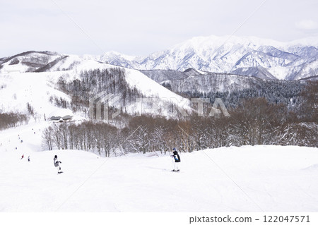 Children enjoying skiing 122047571