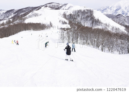 Children enjoying skiing 122047619