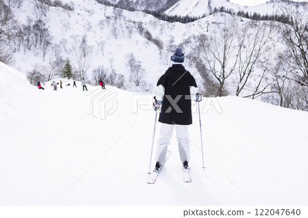 Children enjoying skiing 122047640