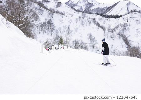 Children enjoying skiing 122047643