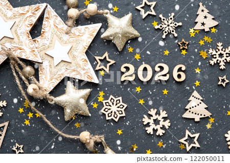Happy New Year-wooden letters and the numbers 2026 on festive black background with sequins, stars, snow. Greetings, postcard. Calendar, cover Happy New Year-wooden letters and the numbers 2026 on festive black background with sequins, stars, snow. Greetings, postcard. Calendar, cover 122050011