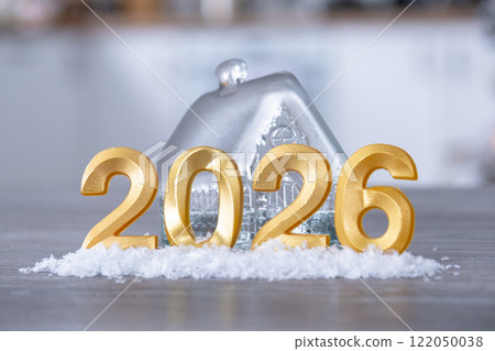 Golden figures number 2026 New Year against the background of tiny house with warm light and garlands. Greeting card, Happy New Year, cozy home Golden figures number 2026 New Year against the background of tiny house with warm light and garlands. Greeting card, Happy New Year, cozy home 122050038