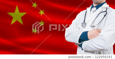 China Health Care concept. Male doctor on China flag. Doctor with crossed arms on China flag 122050141