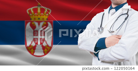Serbia Health Care concept. Male doctor on Serbia flag. Doctor with crossed arms on Serbia flag 122050164