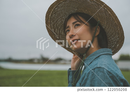 Rain clouds and farmer 122050208