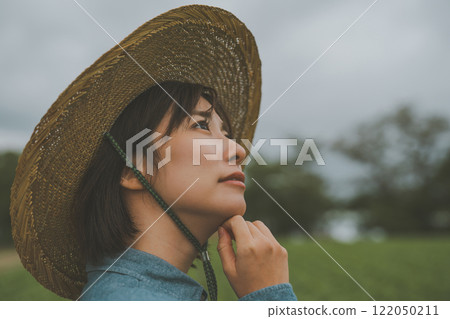 Rain clouds and farmer Rain clouds and farmer 122050211