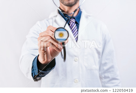 Healthcare System Argentina, doctor holding sthetoscope. Argentina health and medical insurance concept Healthcare System Argentina, doctor holding sthetoscope. Argentina health and medical insurance concept 122050419