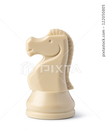 White knight chess piece standing on white background 122050805
