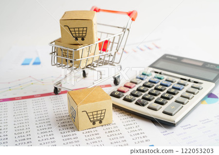 Online shopping, Shopping cart box on business graph, import export, finance commerce. Online shopping, Shopping cart box on business graph, import export, finance commerce. 122053203