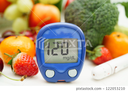 Digital glucose meter food for check sample blood sugar level to treatment diabetes with vegetable and fruit healthy. Digital glucose meter food for check sample blood sugar level to treatment diabetes with vegetable and fruit healthy. 122053210