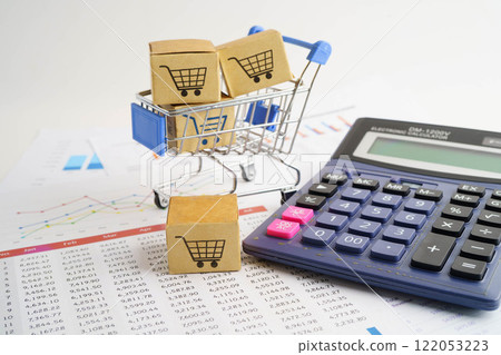 Online shopping, Shopping cart box on business graph, import export, finance commerce. Online shopping, Shopping cart box on business graph, import export, finance commerce. 122053223