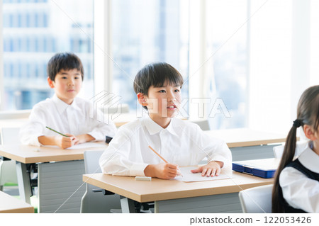Children taking a test Children taking a test 122053426