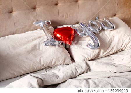 "I love you" from balloon on the bed. Valentine's concept. "I love you" from balloon on the bed. Valentine's concept. 122054003