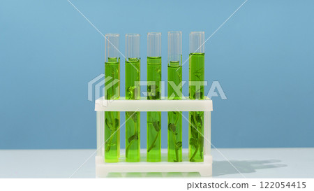 Biotechnology lab. Plant sprout in a test tube. Scientific laboratory and bioengineering Biotechnology lab. Plant sprout in a test tube. Scientific laboratory and bioengineering 122054415