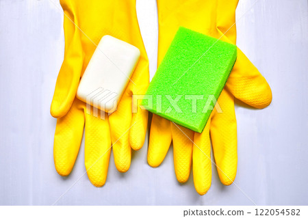 All purpose cleaning kit. Yellow rubber gloves,soap,sponge 122054582