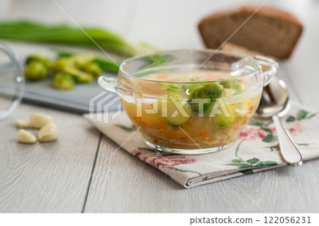 Hot Broth with Brussels Sprouts and Vegetables Hot Broth with Brussels Sprouts and Vegetables 122056231