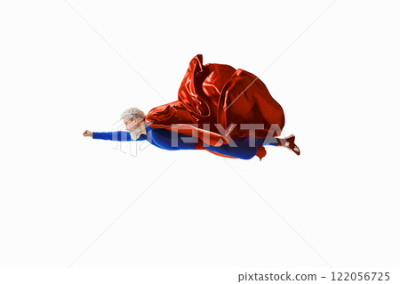 Gray-haired superhero in vibrant blue and red costume flies forward with cape billowing. Determination, fantasy and adventure Gray-haired superhero in vibrant blue and red costume flies forward with cape billowing. Determination, fantasy and adventure 122056725