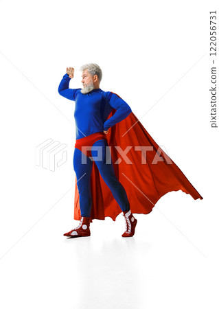 Vision, creativity and innovation. Man in superhero costume standing in a confident pose and looking forward with focus 122056731