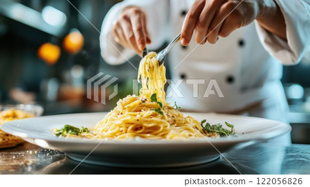 Close up of professional chef serving pasta while working in kitchen. High quality illustration Close up of professional chef serving pasta while working in kitchen. High quality illustration 122056826