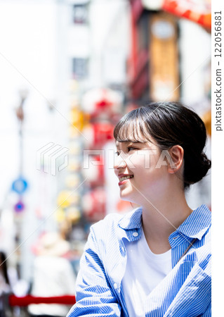 A young woman sightseeing in Osaka A young woman sightseeing in Osaka 122056881