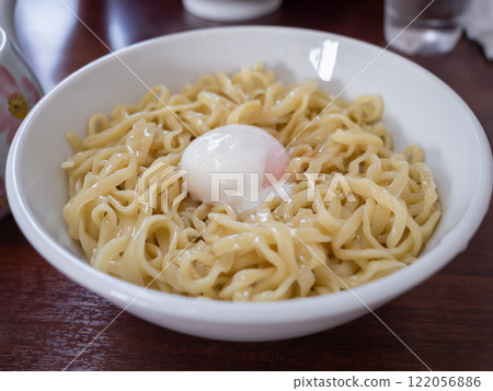 Mazesoba topped with a soft-boiled egg. Soupless ramen. 122056886