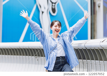 A young woman sightseeing in Osaka A young woman sightseeing in Osaka 122057052