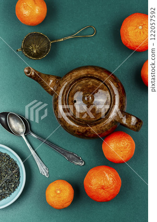 Mandarin tea in ceramic tea pot. 122057592