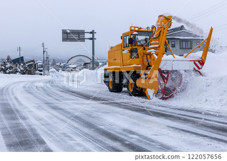 Rotary snowplow to remove snow on the road 122057656