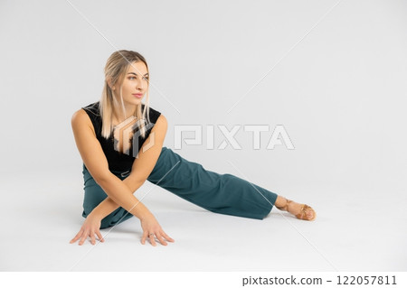 Dancer performing modern dance on white background 122057811