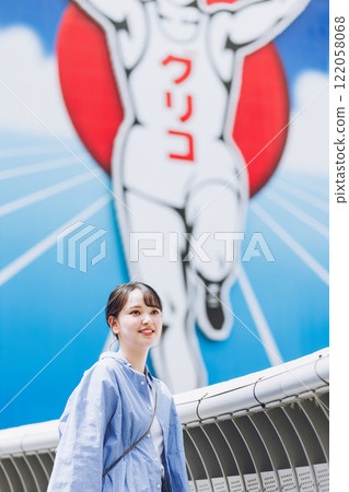 A young woman sightseeing in Osaka A young woman sightseeing in Osaka 122058068