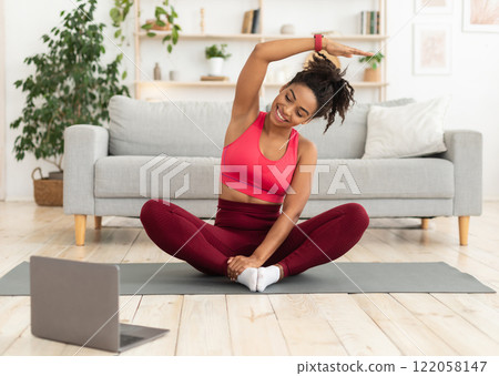 Black Fitness Girl Exercising At Laptop Having Online Training At Home. Stay Fit Concept 122058147