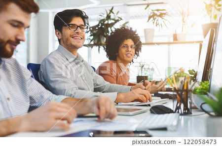 Young male team working at IT developing company, sitting at coworking office, free space 122058473