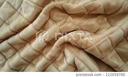 Coarse canvas fabric in tan color, with a rugged texture and woven detail 122058780
