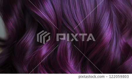 Glossy purple hair cascades in soft waves, catching the light beautifully for a striking effect. 122059803