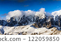 Snow-covered Alps and blue skies 122059850