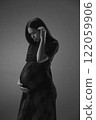 Pregnant Asian woman smiling 122059906