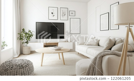 A stylish living room features a large television, a cozy sofa adorned with soft cushions, and a minimalist coffee table. Large windows fill the space with natural light, creating a warm atmosphere. 122061205