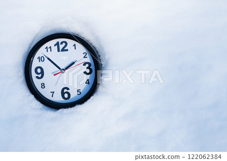 Clock In Snow 122062384